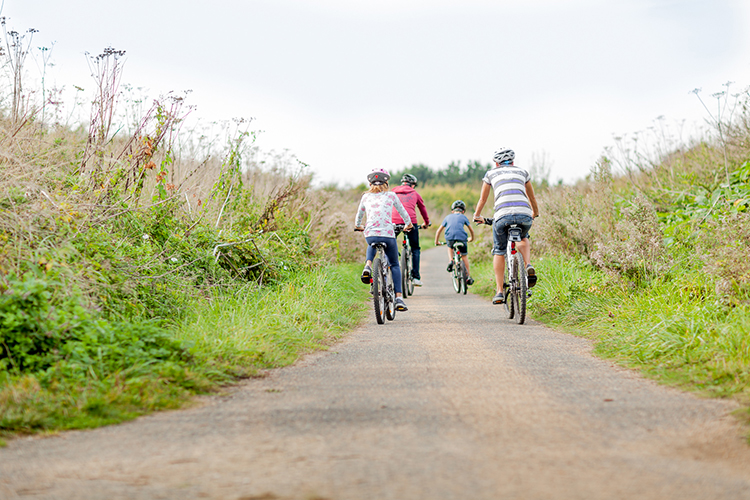 Family enjoying a bike ride on the Isle of Wight