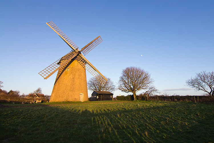 Bembridge Windmill standing against a clear sky
